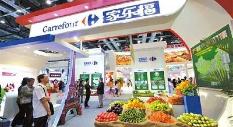 Carrefour en Chine, sur son bonhomme de chemin